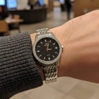 Birna Men’s Designer Quartz Watch – Midnight Black Dial with Red Accents & Faceted Crystal Bezel