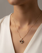 Gold-Tone Floral Wreath Pendant with Black Onyx Accents