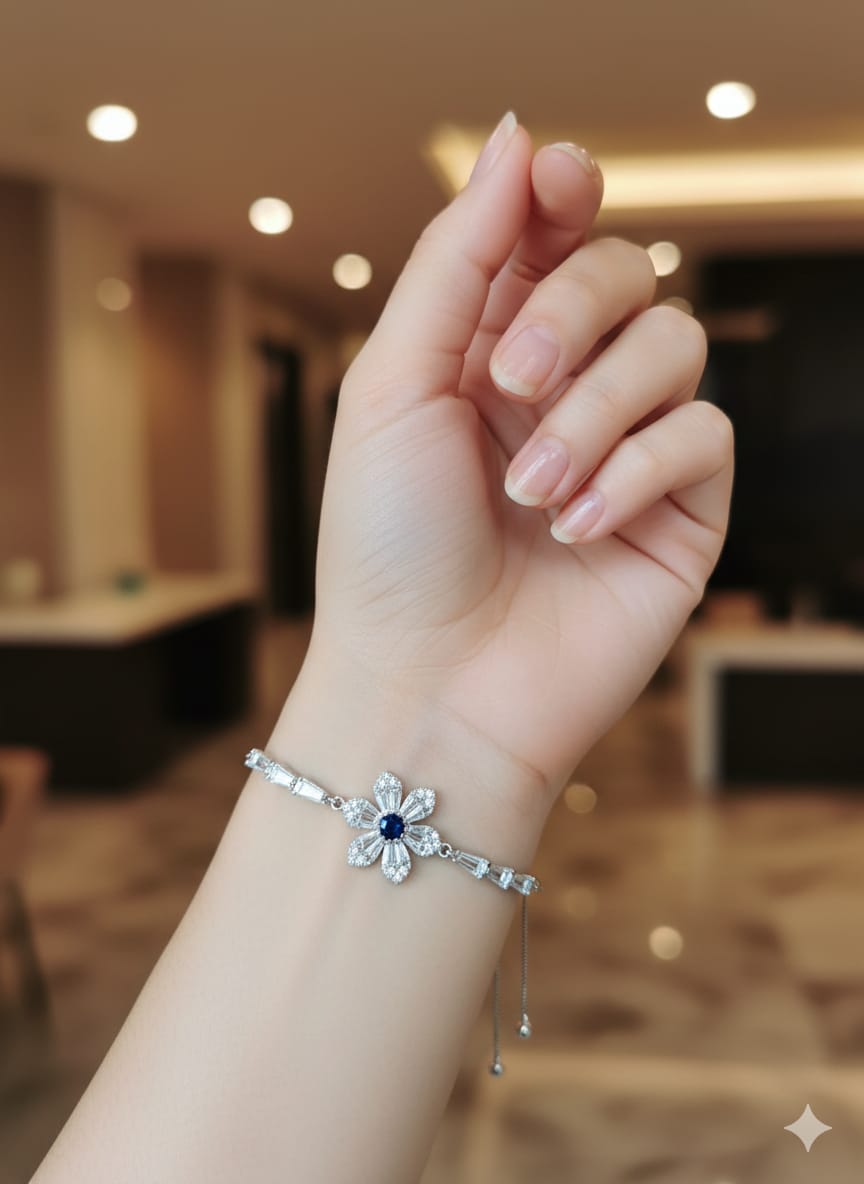 Dainty Silver Floral Bracelet – Blue Sapphire Centerpiece with Baguette Crystals