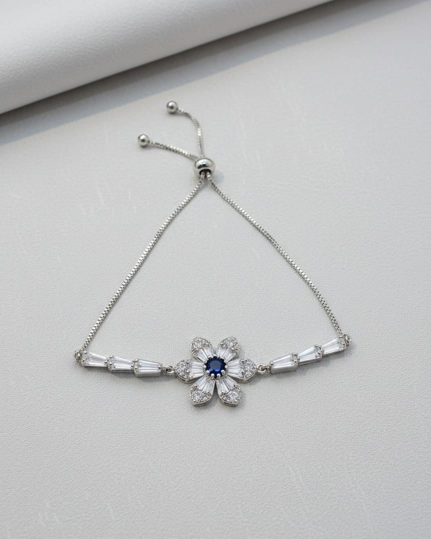 Dainty Silver Floral Bracelet – Blue Sapphire Centerpiece with Baguette Crystals