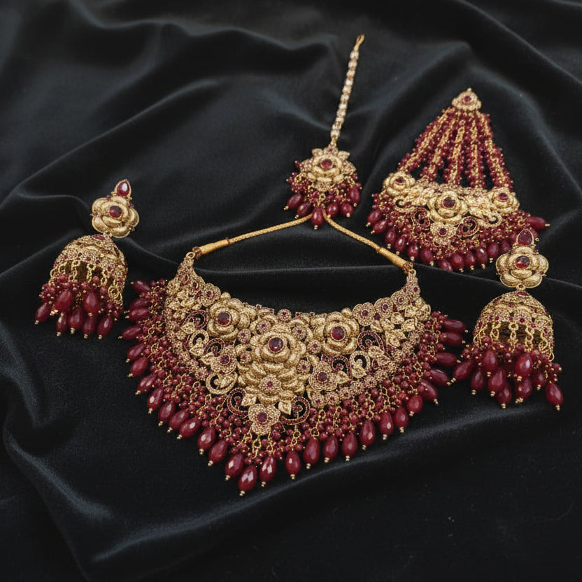 Heritage Maroon Pearl & Gold Heavy Bridal Set – Choker, Jhumkas, & Tikka
