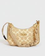 Monogram Crescent Hobo – Beige Jacquard Bag with Ruched Leather Handle