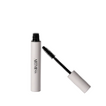 Mascara with white casing and black wand on a white background